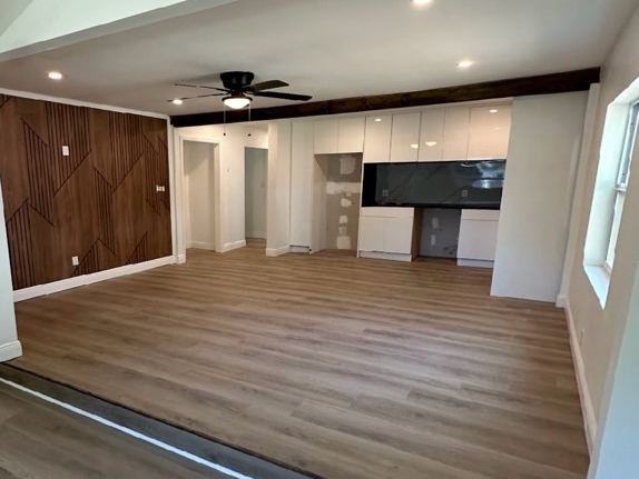 Open living area inside C.A.L.I. Place with new flooring