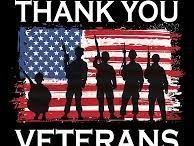 Silhouettes of service members in front of an American flag